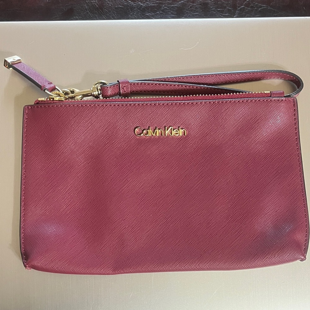 Calvin Klein Maroon Wristlet with Gold Accents